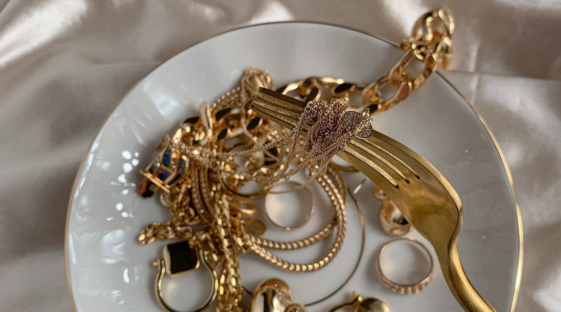 aesthetic image of solid gold jewelry and gold coated jewelry